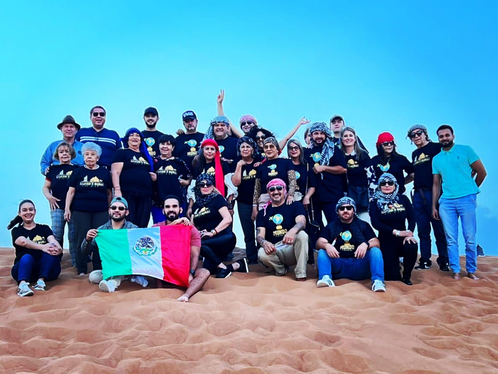 Group of guests on the red dunes
