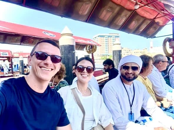 Muhammad Bilal with guests on an abra ride across Dubai Creek