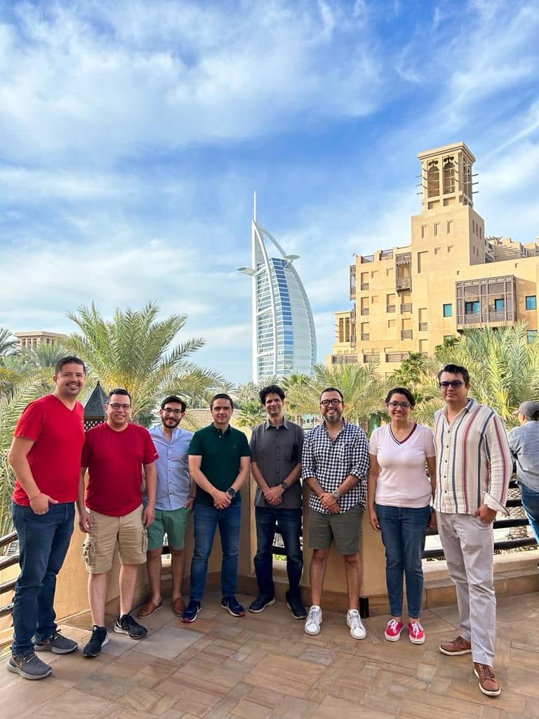 Group of guests at Madinat Jumeirah with Burj Al Arab