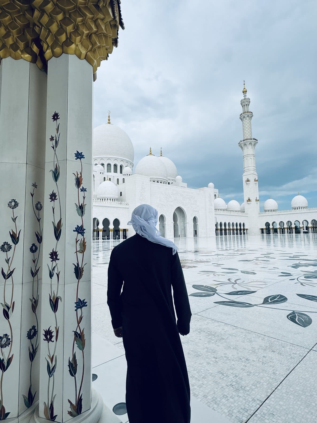 The marble courtyard of Sheikh Zayed Grand Mosque on a private Abu Dhabi tour